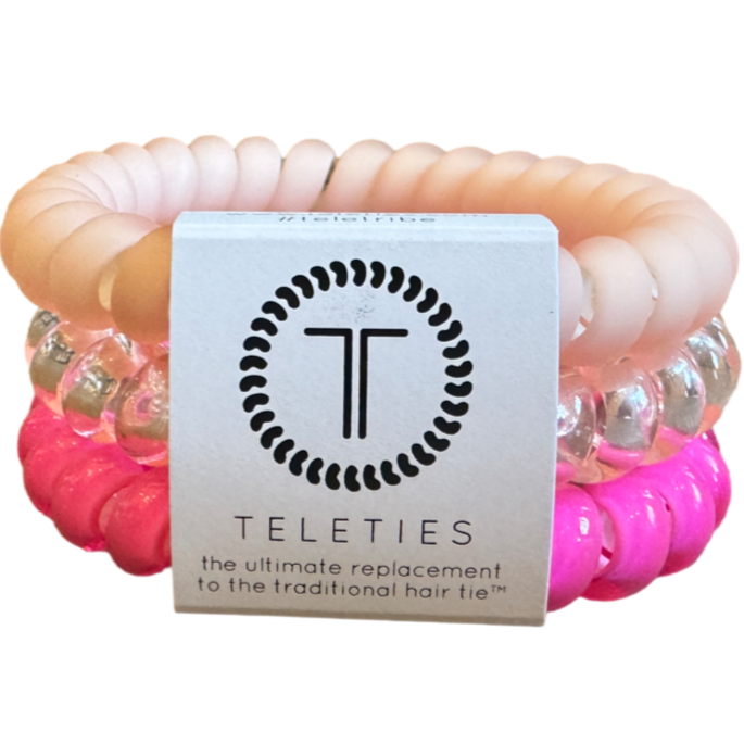 TELETIES hair ties, Aruba Pink Blush hair ties, no-rip hair ties, large spiral hair coils, spiral hair ties, stylish hair accessories, hair ties that double as bracelets, durable hair ties, pink hair ties for thick hair, hair accessories in pink.