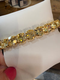 TOVA Oakland Stretch Bracelet in Solid Lemon Medium featuring vibrant yellow crystals set in antique gold-plated brass.