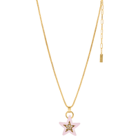 Gold necklace with a star-shaped pendant on a white background