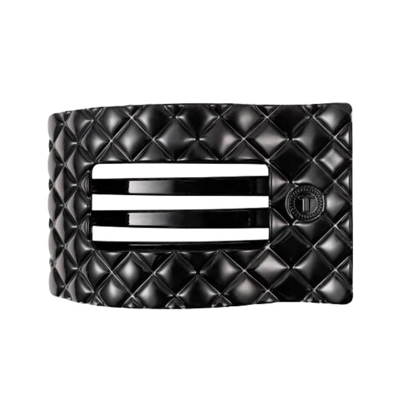 Black quilted clutch bag with a brand logo on a white background