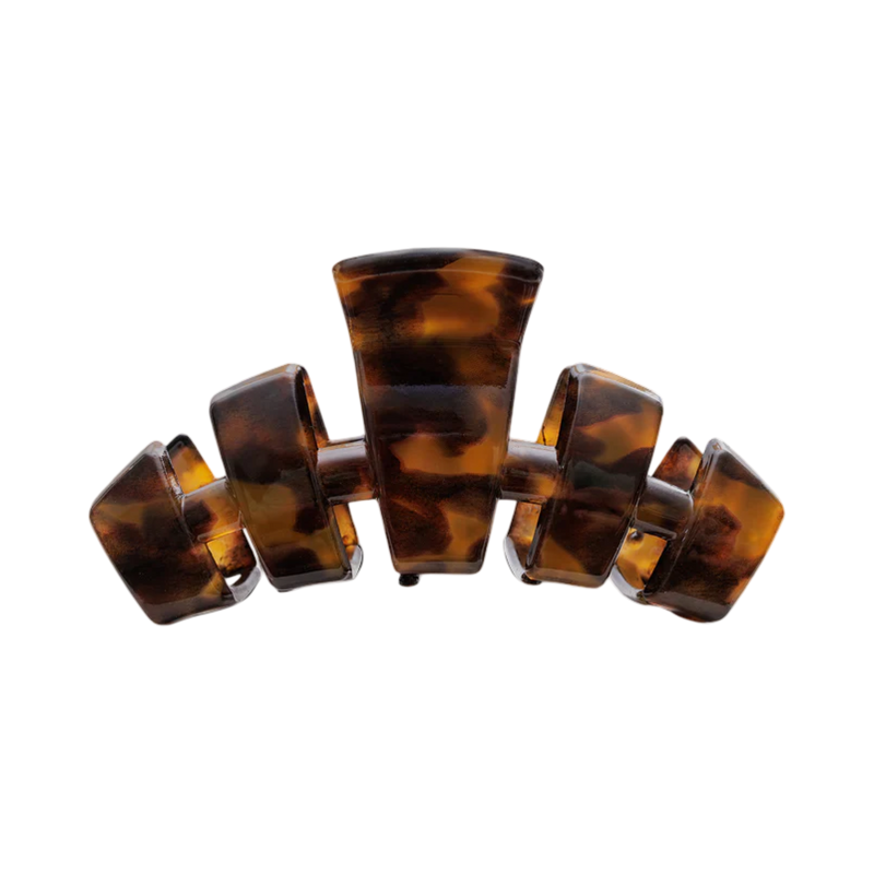 Tortoiseshell hair clip on a white background