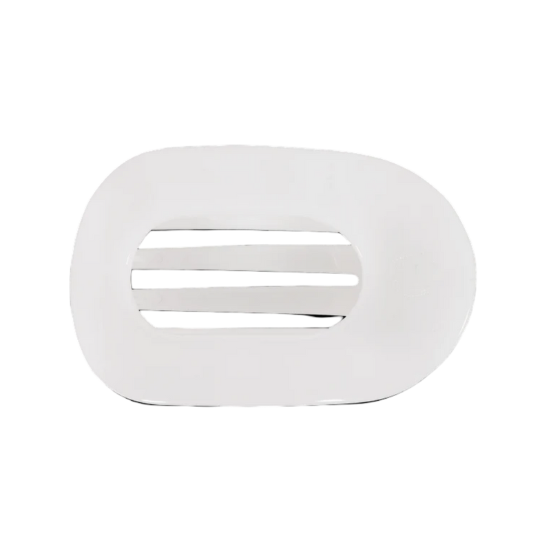 White  oval flat hair clip on a white background