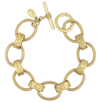 Victorian scroll bracelet, embossed link bracelet, La Vie Parisienne jewelry, antique style bracelet, vintage inspired scroll bracelet, Parisian bracelet design, ornate gold bracelet, stacking link bracelet, classic French bracelet, detailed metal bracelet