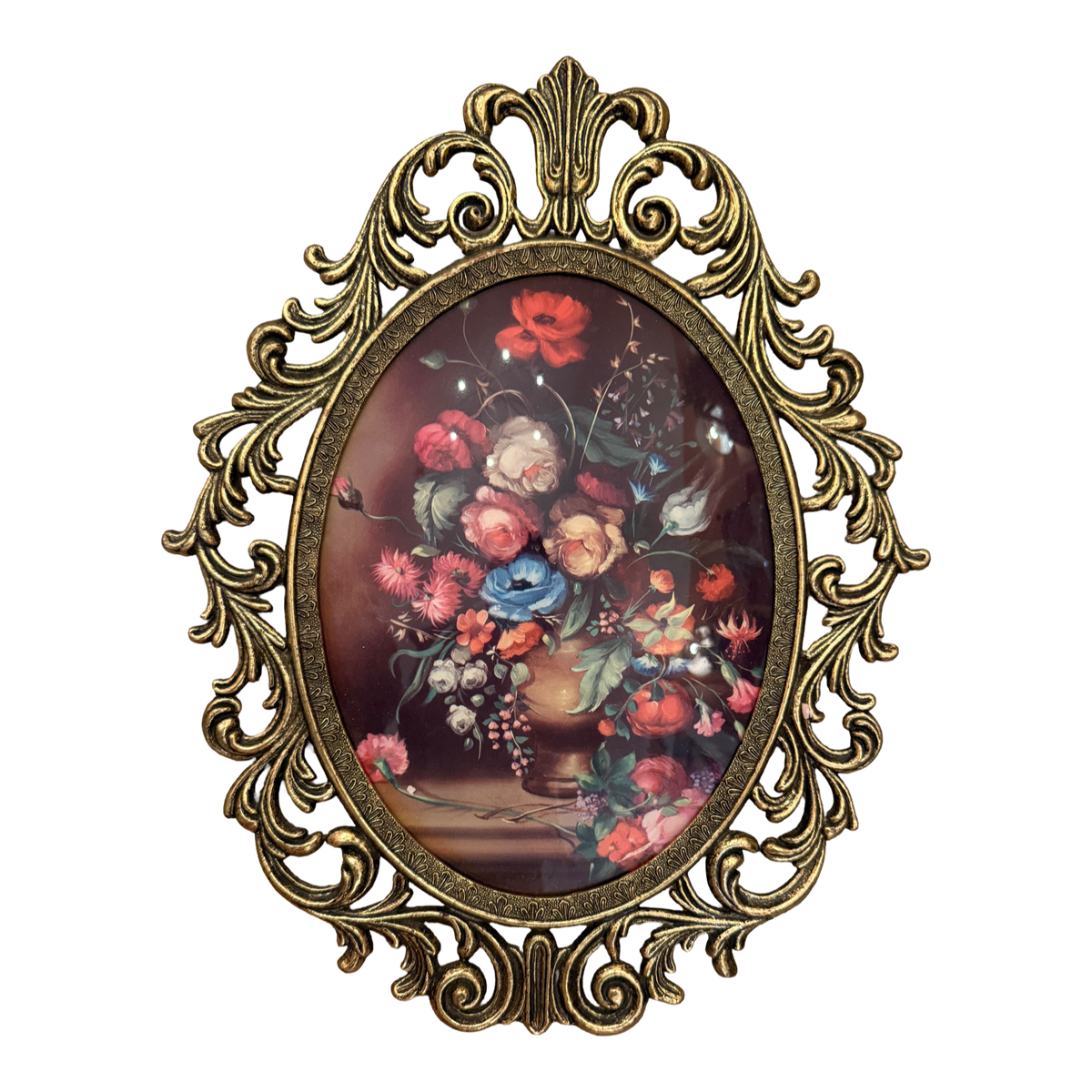 An ornate oval wall art piece featuring a classical-style floral bouquet painting in a gold-toned baroque frame, set against a plain white background.