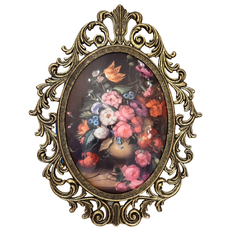 Vintage 14-inch oval floral wall art with pink, coral, orange, blue and purple flowers in an ornate antiqued gold scrolling frame.
