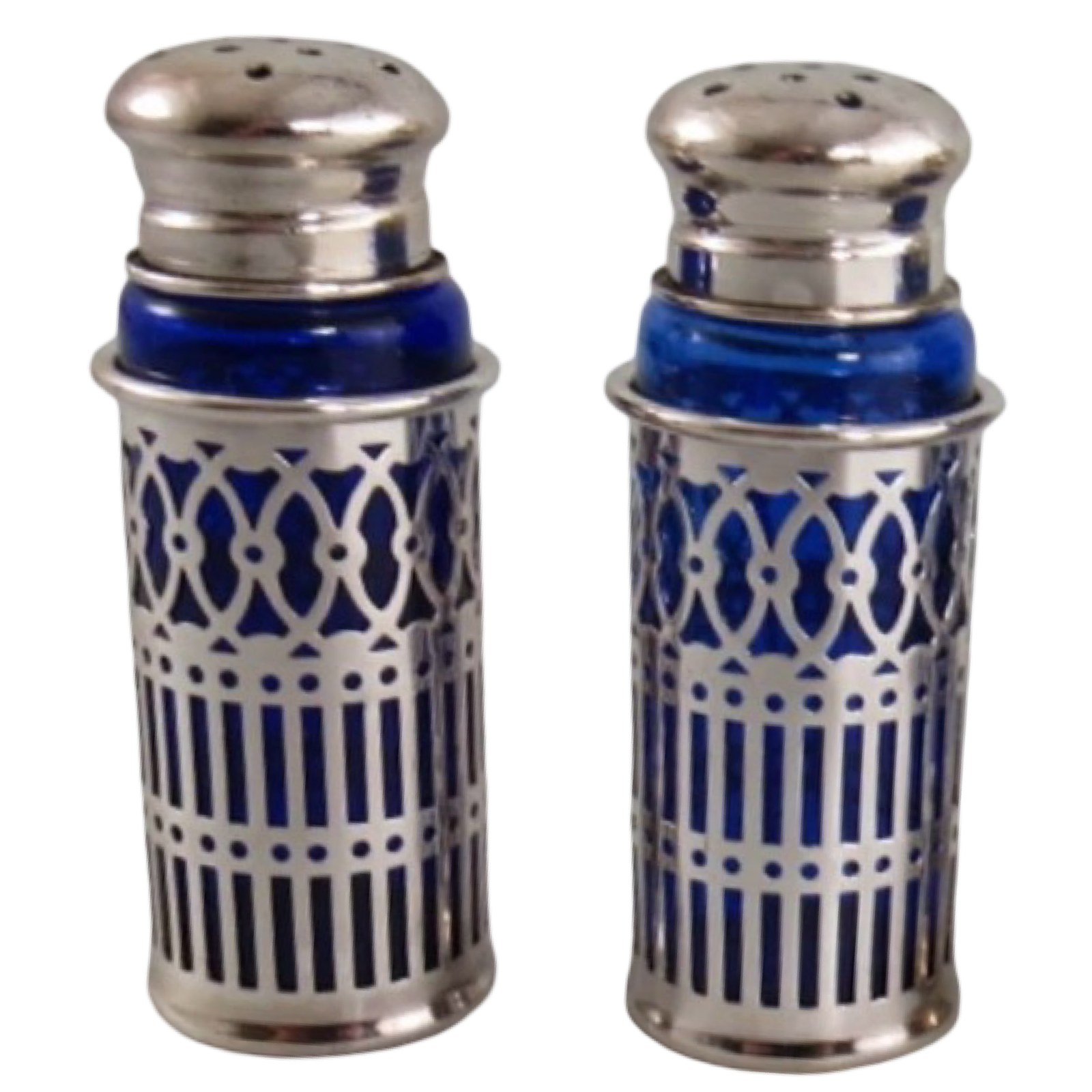 Vintage Japanese cobalt blue glass salt and pepper shakers with ornate silverplate filigree sleeves, sold as a coordinating set of two.