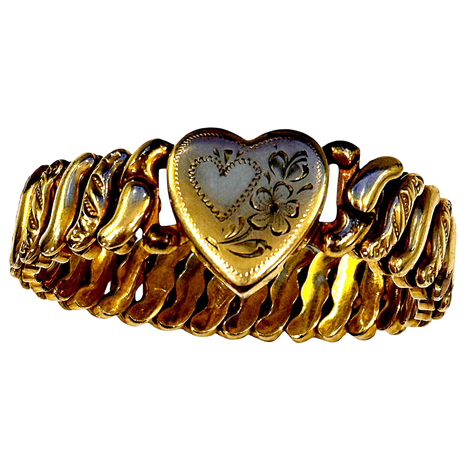 Gold ring with a heart-shaped emblem on a white background