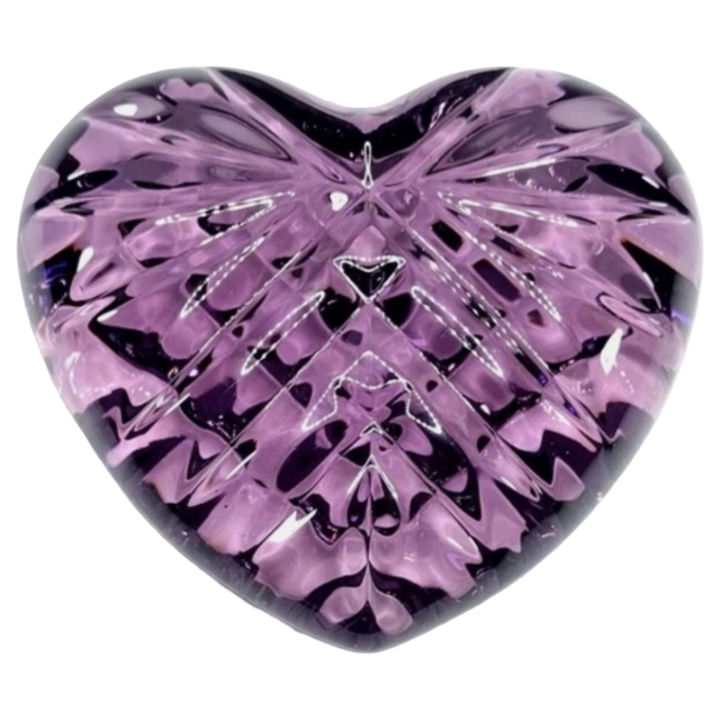 Purple heart-shaped crystal on a white background