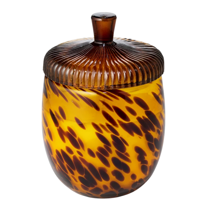 Tortoiseshell-patterned jar with a ribbed lid on a white background