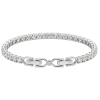 Anna Zuckerman Avery 10 Carat Tennis Bracelet with round Diamond Crystalline stones and a signature center-stone link clasp in platinum-plated brass.