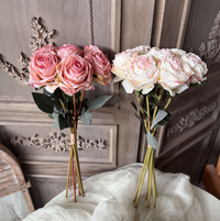Burgundy vintage-style faux rose bouquet with seven full layered rose stems and leaves
