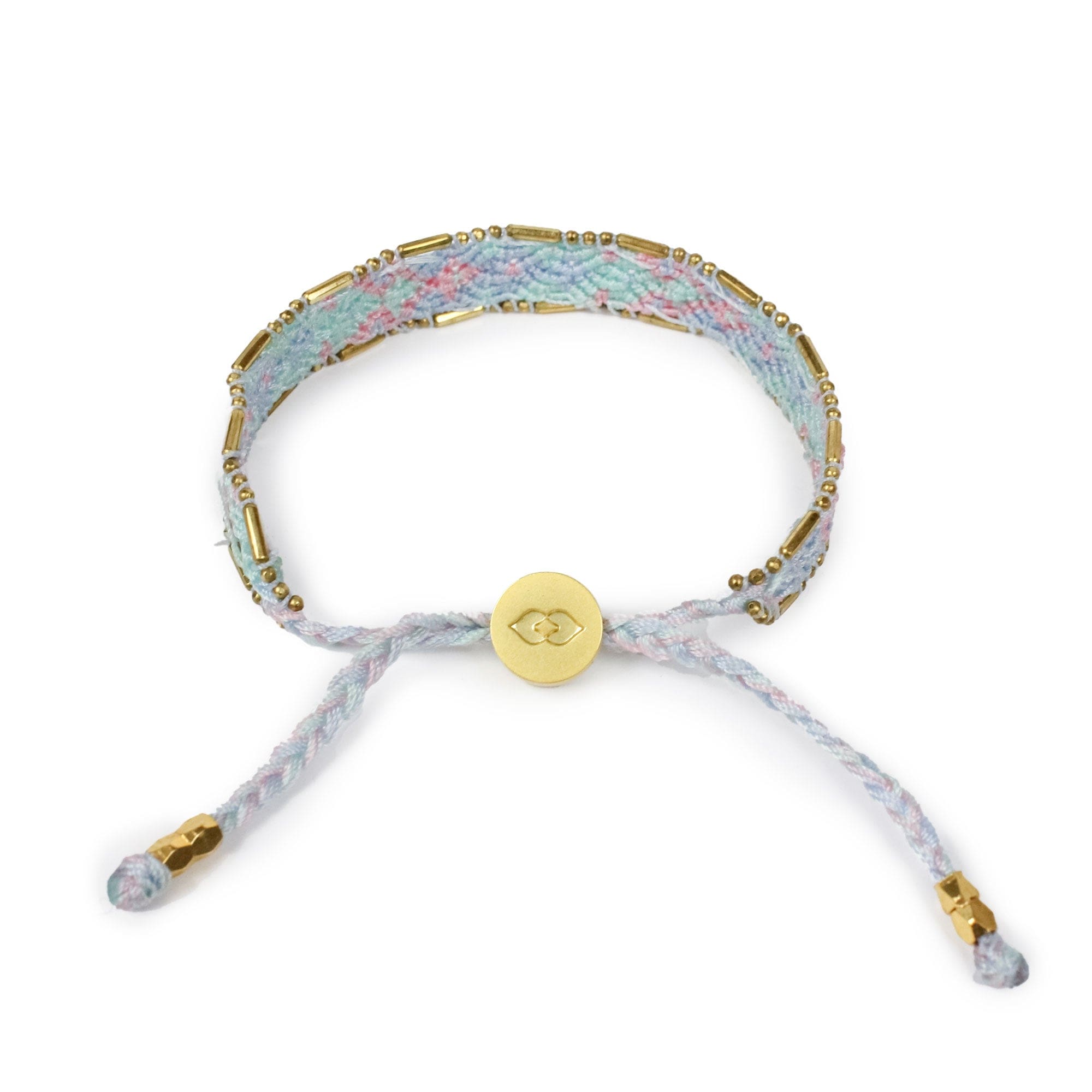 Bracelet with floral pattern and gold accents on a white background