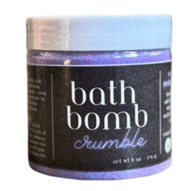 Container of bath bomb crumble purple