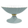 Light blue decorative bowl with gold base on a white background