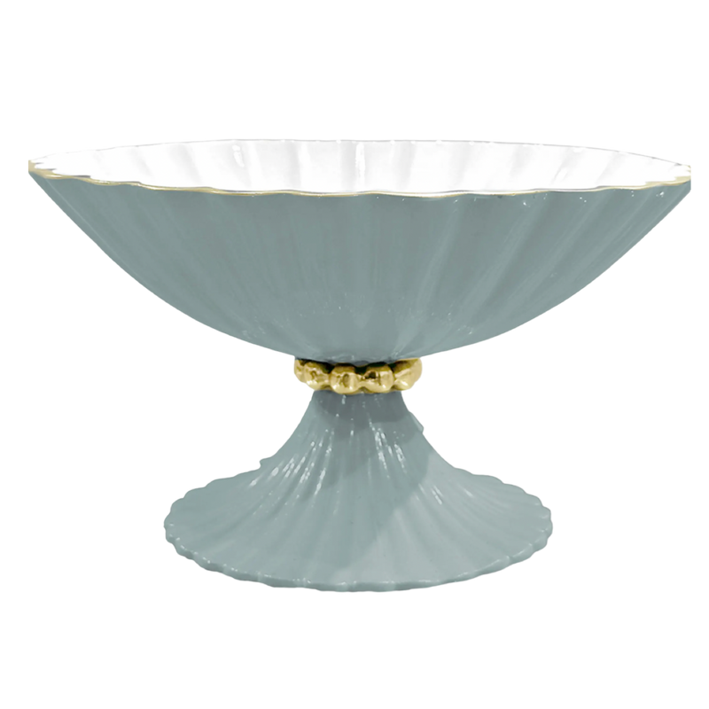 Light blue decorative bowl with gold base on a white background
