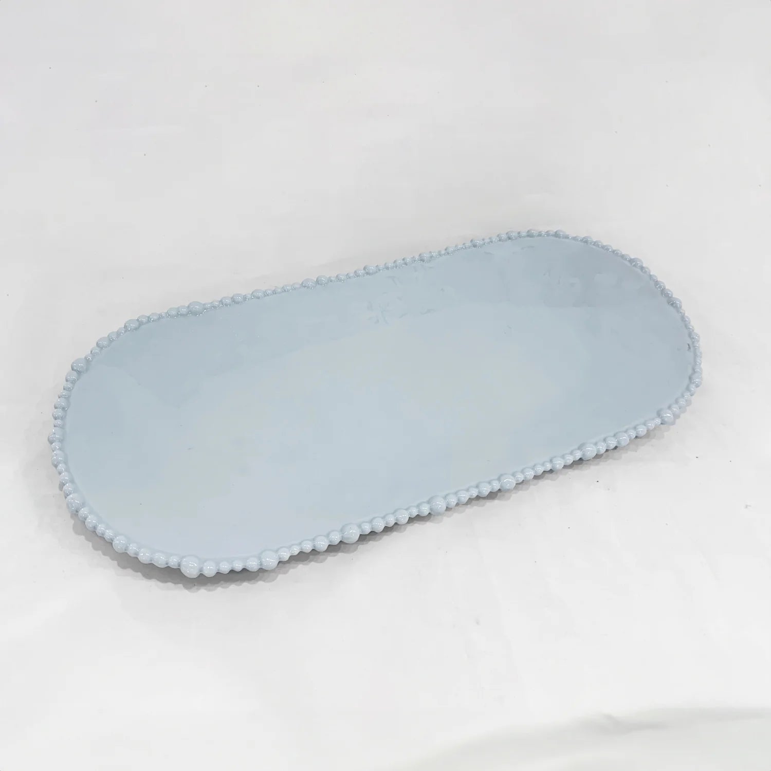 beatriz ball platter, blue algeria oval platter, beatriz ball large serving platter, handcrafted ceramic platter, designer serveware, blue glazed platter, artisan entertaining dish, beatriz ball tableware