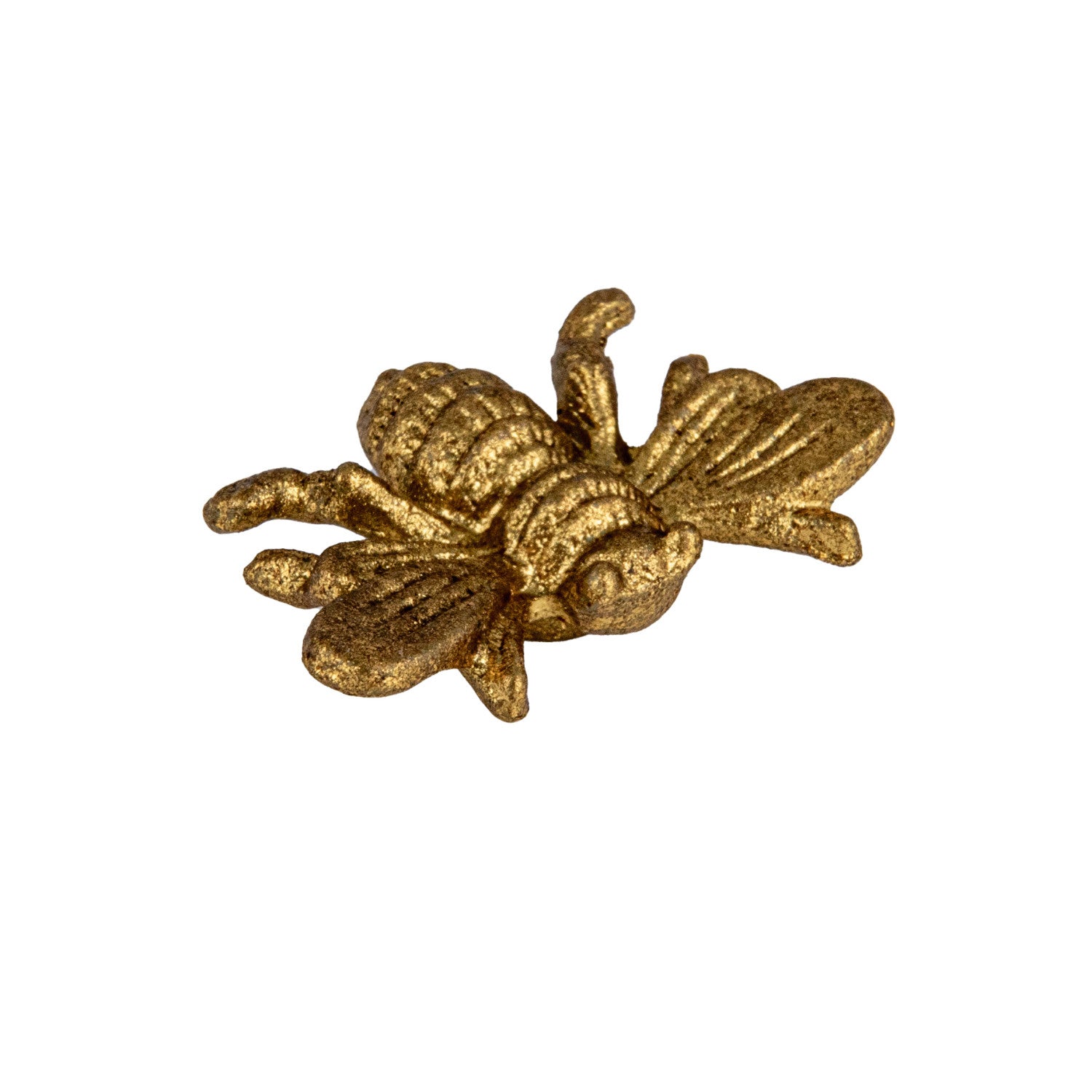 Gold bee-shaped decorative object on a white background