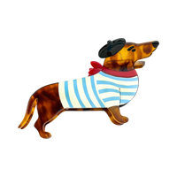 Blue acetate dachshund-shaped hair claw clip featuring a playful black beret detail.