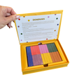 boxed dominoes game, tabletop dominoes set, stylish dominoes gift, classic domino game, colorful wooden dominoes, gold foil domino set, family game night essentials, design-focused dominoes, giftable board games, modern domino set