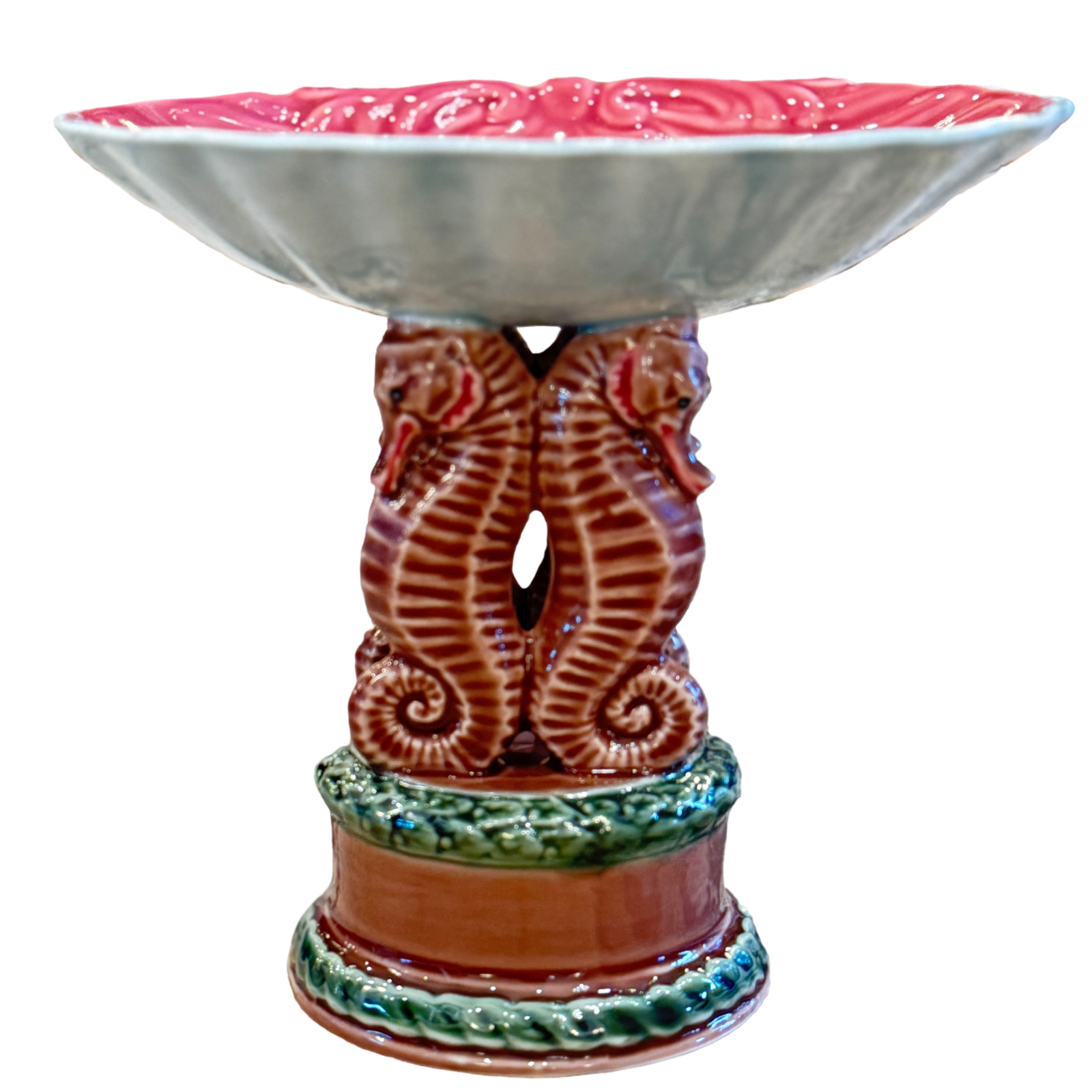 Ceramic bowl with seahorse design on a white background