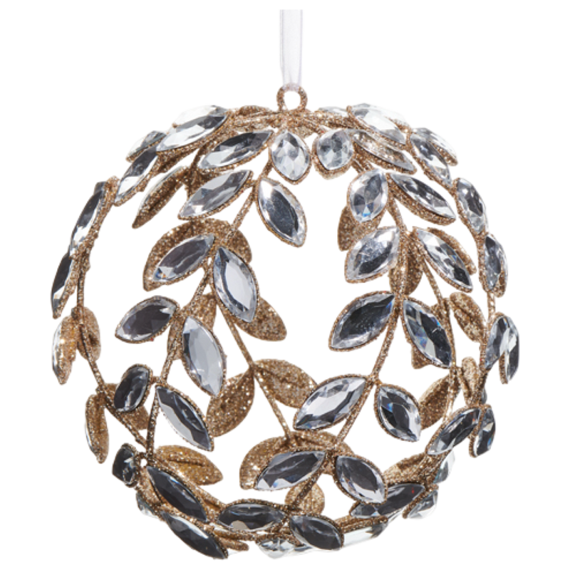 Decorative ornament with leaf-like design and gemstones on a white background