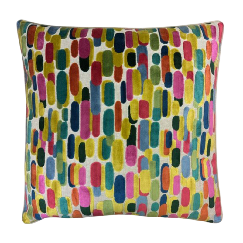 Multicolored abstract patterned pillow on a white background
