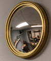 convex bullseye mirror, extra small gold wall mirror, Vagabond Vintage convex mirror, gold leaf decorative mirror, fish-eye effect mirror, round convex metal mirror, antique style wall accent, vintage inspired gold mirror, small statement mirror, stanton bullseye mirror