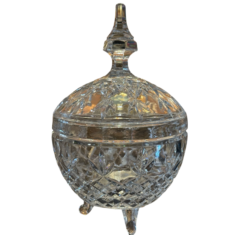 Decorative crystal container with a lid on a white background