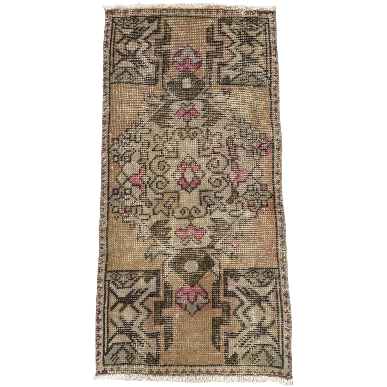 Decorative rug with intricate patterns on a plain background