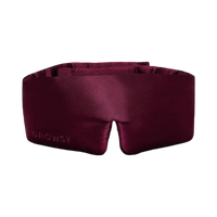 Maroon sleep mask with 'Drowsy' branding on a white background