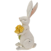 table top bunny holding yellow tulips