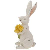 table top bunny holding yellow tulips