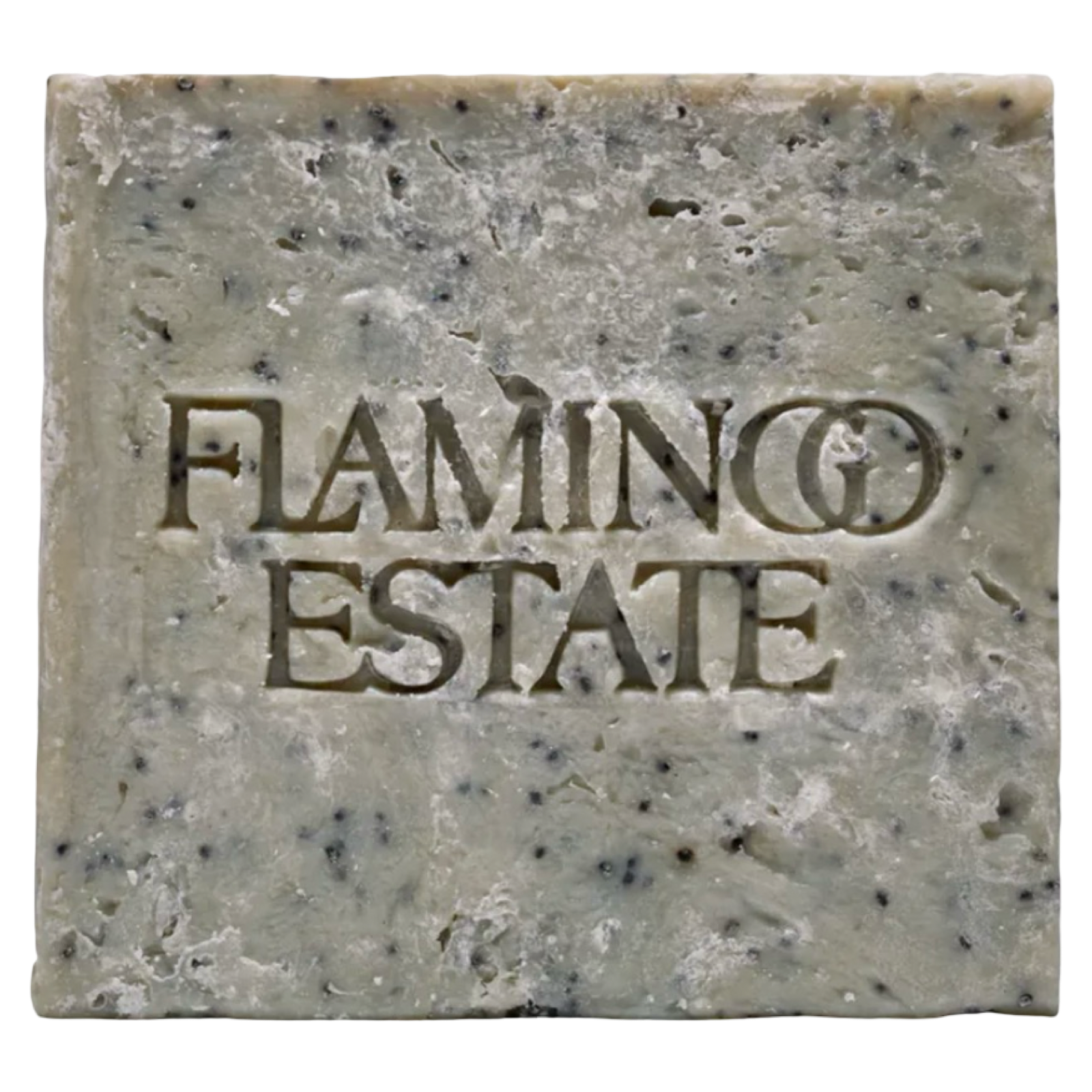 A single rectangular bar of handmade soap with a rustic, textured surface speckled with dark flecks. The brand name 'FLAMINGO ESTATE' is embossed in the center of the soap.