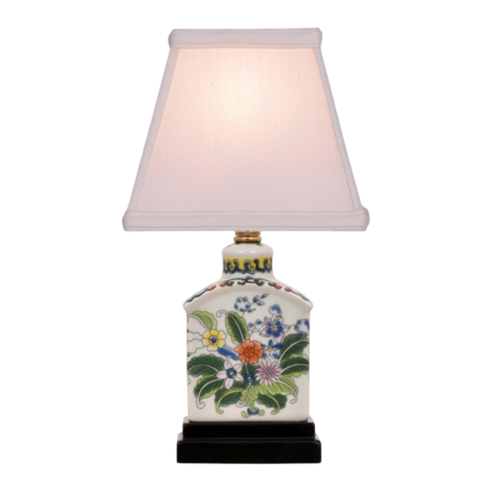 Decorative table lamp with floral design on a white background