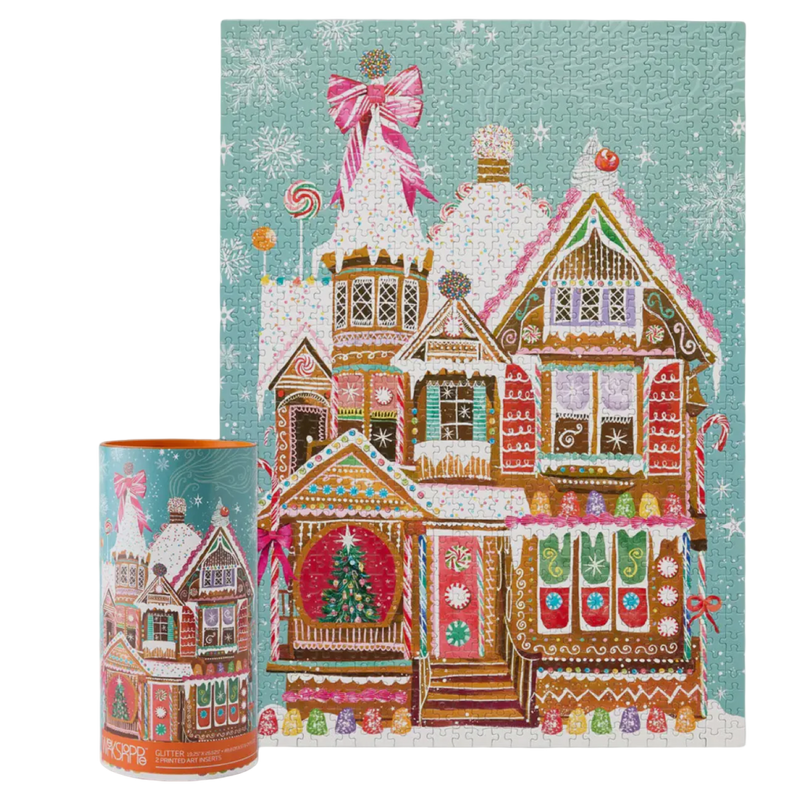 Decorative gingerbread house design on a cylindrical container with a festive background.