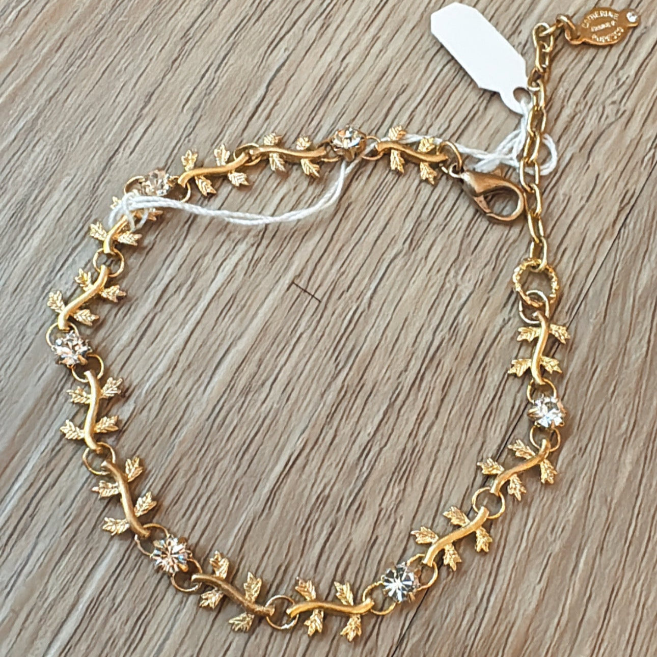 gold vine bracelet, Parisienne style bracelet, crystal embellished bracelet, La Vie jewelry, elegant gold bracelet, feminine dainty bracelet, floral inspired gold jewelry, French garden jewelry, delicate vine accessory, romantic gold crystal bracelet