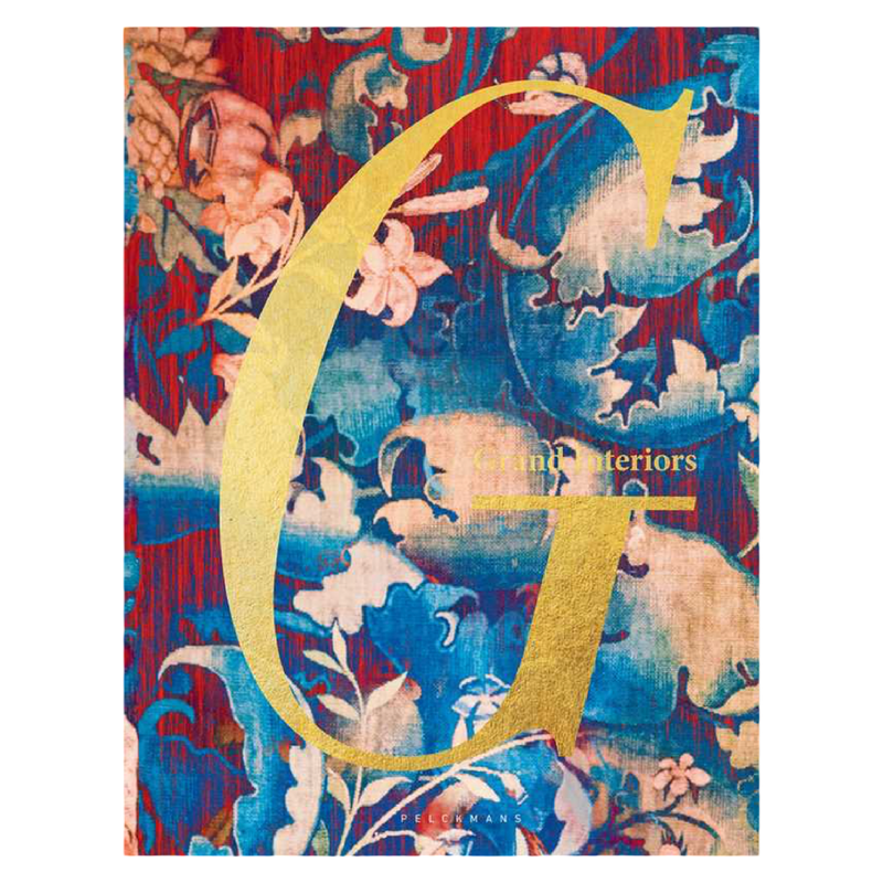 Decorative book cover with a large yellow letter 'C' on a colorful floral and abstract patterned background.
