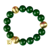 green beaded bracelet, black and gold stretch bracelet, Brianna bracelet green, stackable bead bracelet, casual everyday jewelry, stretchy fashion bracelet, layering bracelet for women, modern beaded bracelet, green and gold bracelet, comfy chic bracelet

