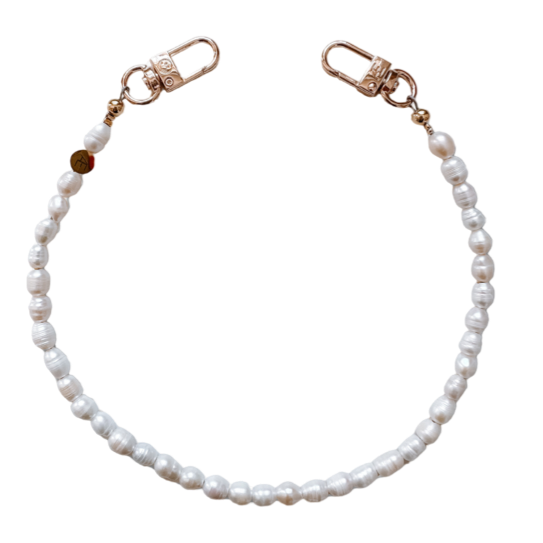 handmade cell phone wristlet, pearl cell phone wristlet, sea pearl charm wristlet, elegant phone accessory, luxury phone holder