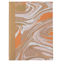 Notebook with marbled cover design on a white background
