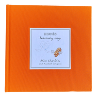 Orange book with a blue label featuring text and illustrations on a white background