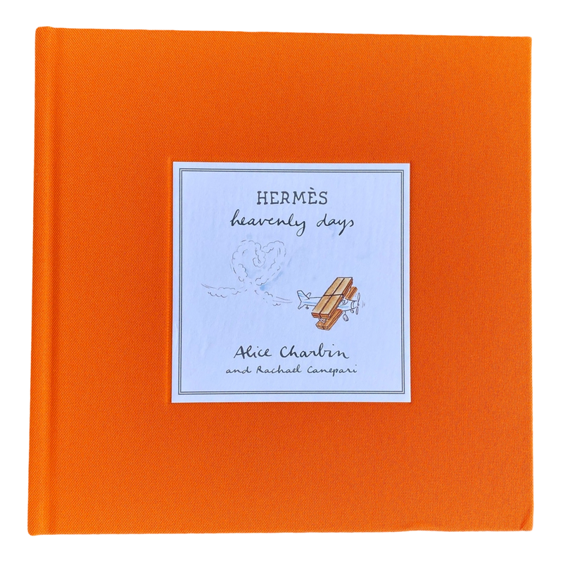 Orange book with a blue label featuring text and illustrations on a white background