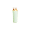 Light green matches with gold cap on a white background