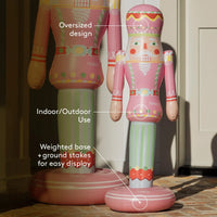 Decorative inflatable nutcracker with features highlighted on a neutral background