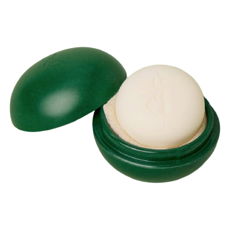 Kate McLeod Body Stone Travel Case in Mint and Pine with a subtly speckled finish and embossed logo.