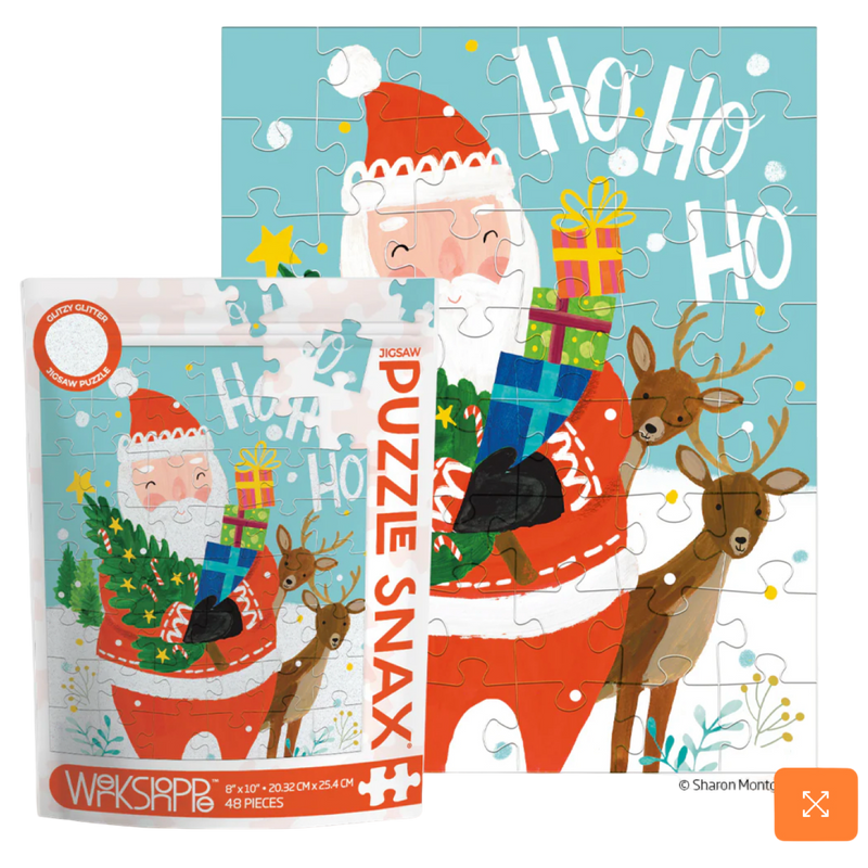 Christmas-themed puzzle with Santa Claus and reindeer, featuring the brand 'Puzzle Snax'.