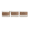 Three white terry tea towels with brown labels on a white background