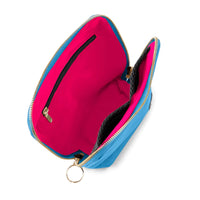 kusshi everyday makeup bag, light blue makeup bag, kusshi cosmetic bag, neon pink interior bag, travel makeup bag, stylish toiletry bag, kusshi blue pink bag, everyday beauty bag