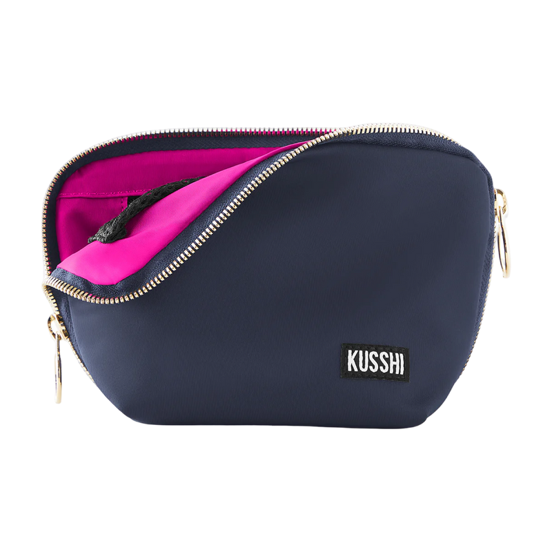 kusshi everyday makeup bag, navy cosmetic bag, kusshi makeup organizer, travel makeup bag, navy pink makeup bag, kusshi toiletry bag, everyday beauty bag, durable fabric makeup case