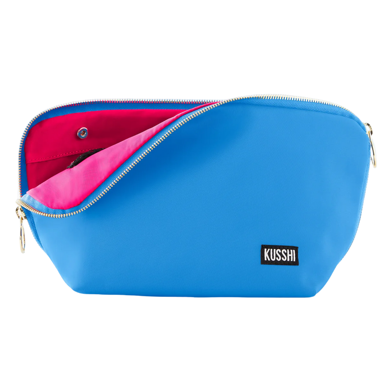 Blue pouch with pink interior and 'Kusshi' branding on a white background